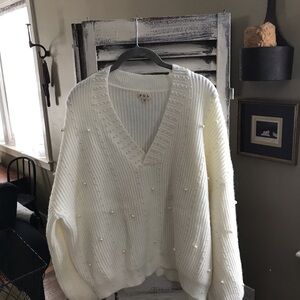 Elegant White Pearl-Embellished Sweater